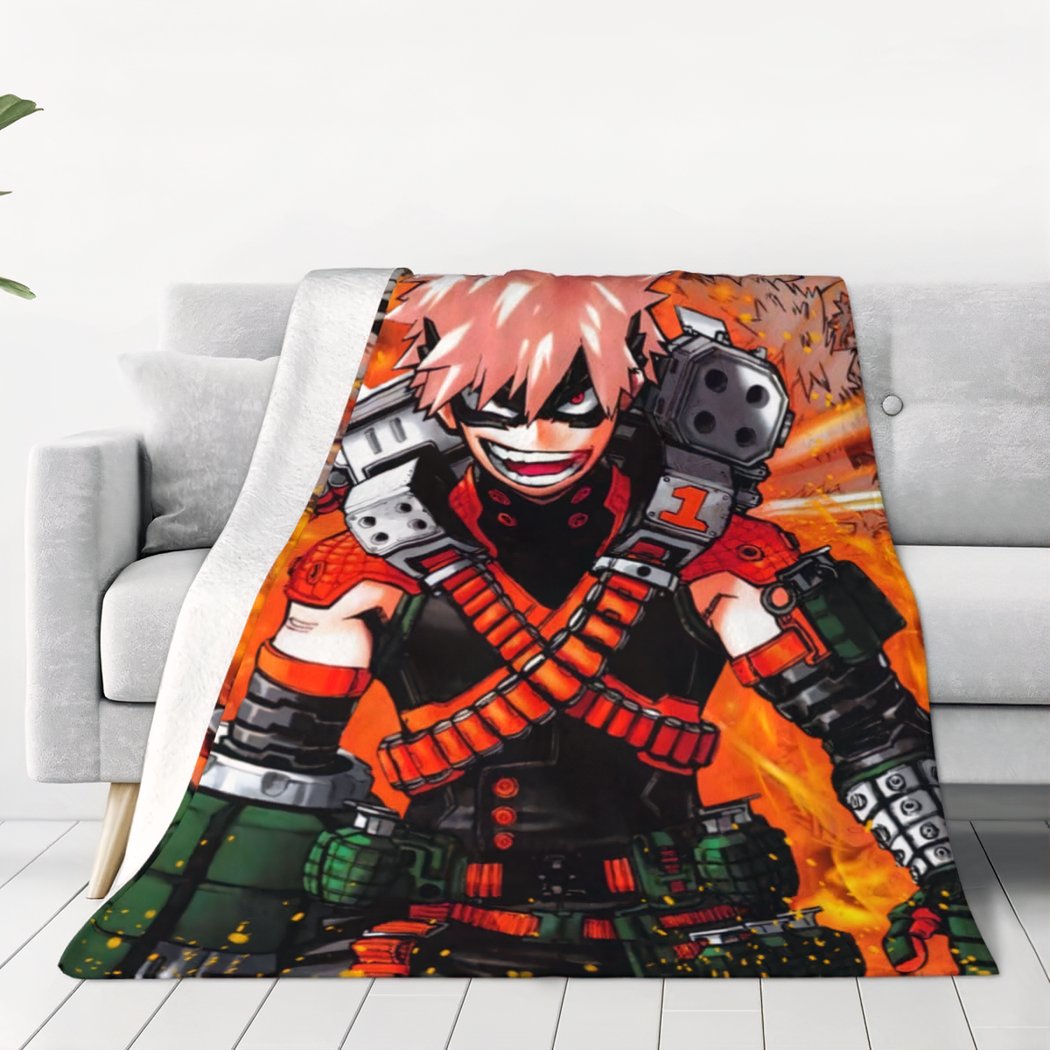 couverture imprimé de bakugo personnage de My hero Academia en rouge sur un canapé gris