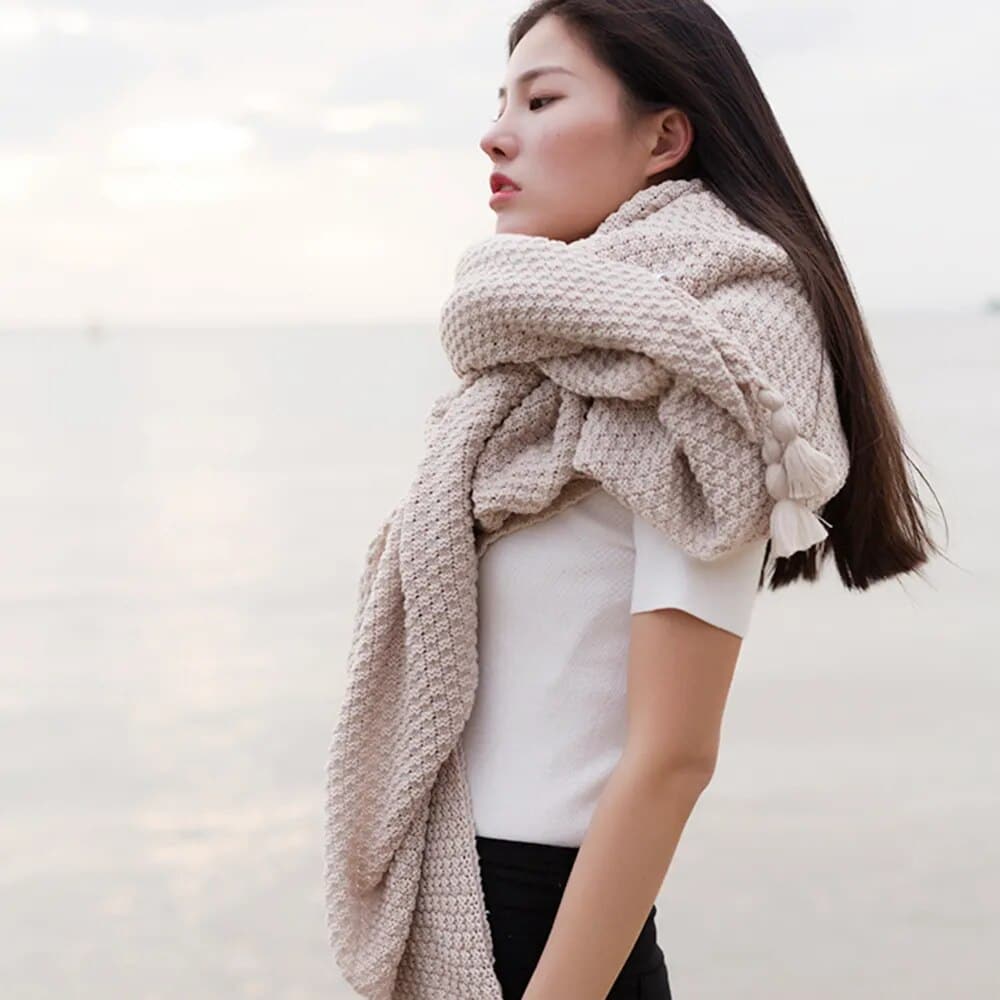 Les critères essentiels pour sélectionner une couverture Tout savoir sur les couvertures couverture chaude avec pompons 4