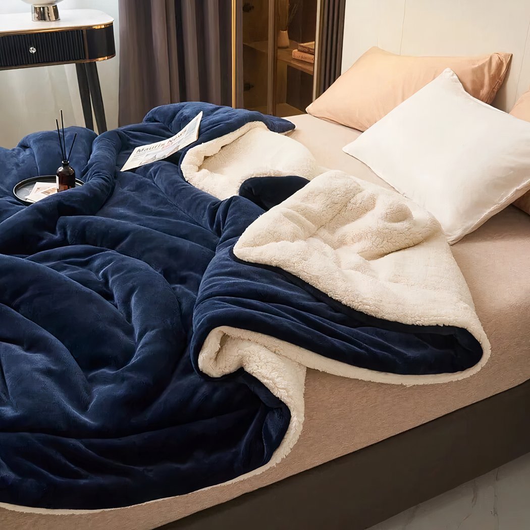 Couverture Chaude Double Couche sur un lit dans une chambre