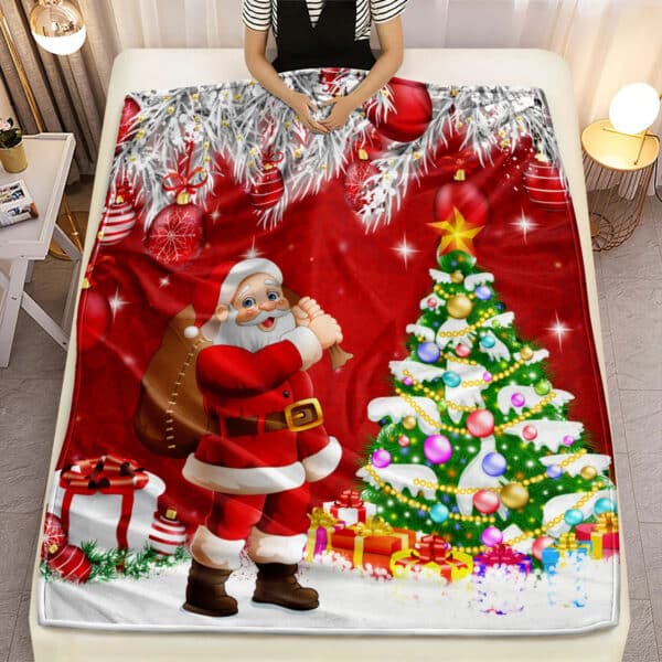 Plaid de Noël en Tissu Microfibre avec Imprimé de Père Noël sur un lit avec une personne